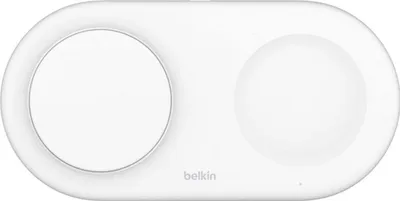 A white Belkin wireless charger with two circular indentations for charging devices.