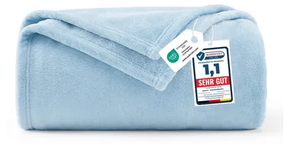 Immagine prodotto di WAVVE, coperta avvolgente, azzurra. Coperta in pile morbido, 130x150 cm, ideale come coperta per divano, per riscaldarsi in casa, o come coperta morbida per divano e letto