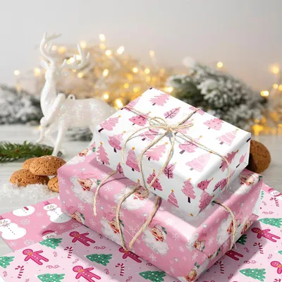 Productafbeelding van Famanu cadeaupapier, 12 stuks - 66 cm x 50 cm - Roze Kerstman