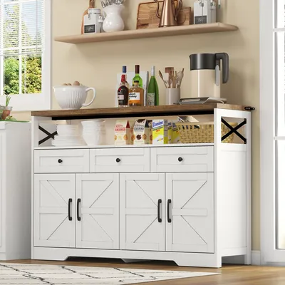 A white buffet sideboard with a wooden top, set in a kitchen or dining area.