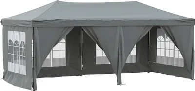 A gray party tent with windows and side walls, shown from the front.