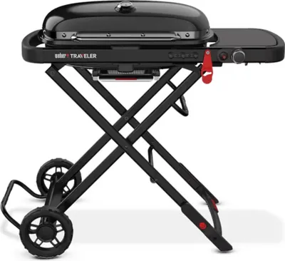 A black Weber Traveler portable grill is shown on a white background.