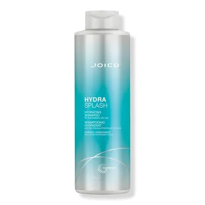 A product shot of a bottle of Joico HydraSplash Hydrating Shampoo against a white background.