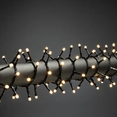 Produktbild von Konstsmide Micro LED Compactlights, gefrostet, 1500 warm weiße Dioden, 30V, Außen (IP44), schwarzes Kabel - 3871-130