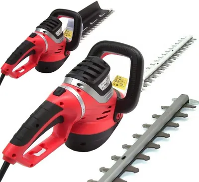 Two red and black electric hedge trimmers are shown against a white background, with a spare blade in the foreground.