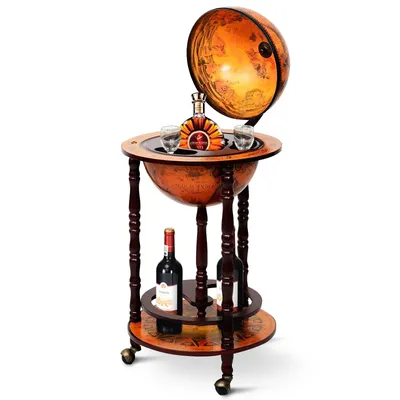 A globe bar cart with bottles of wine and glasses.