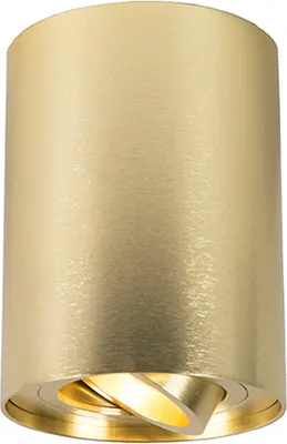 A close-up studio shot of a brass cylinder spotlight with the light emitting from the bottom.