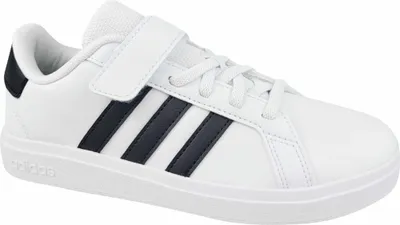 A white Adidas sneaker with black stripes and a black heel accent, shown from the side.