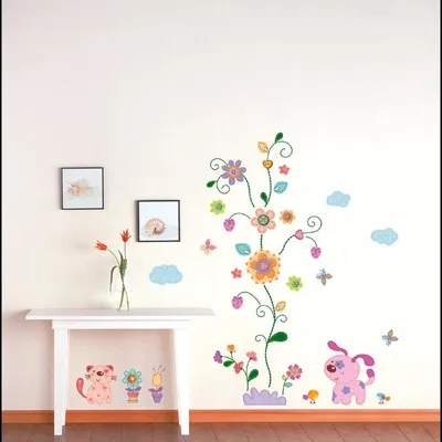 Produktbild von Dekorative Wandaufkleber mit Blumen- und Welpenmotiven.