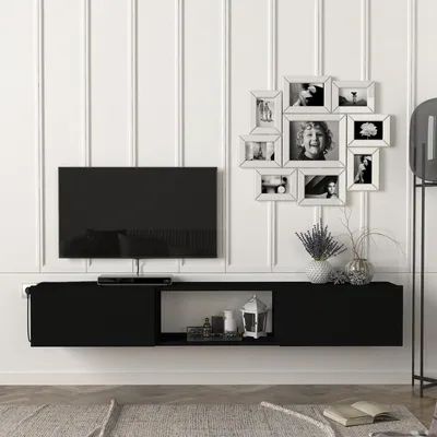 A modern living room setup with a wall-mounted TV and entertainment unit.