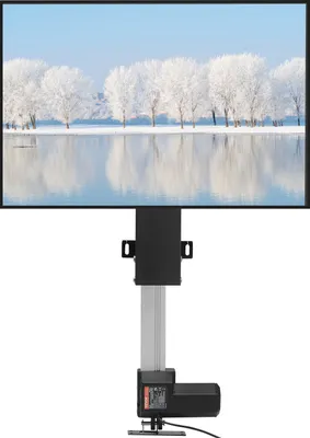 A TV stand with a screen displaying a winter landscape.