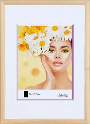 A framed picture of a woman with flowers in her hair.