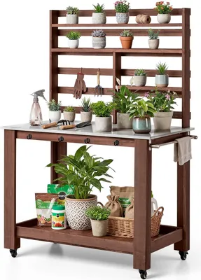 Immagine prodotto di Tavolo da giardinaggio e tavolo da rinvaso - Tavolo da giardinaggio - Piano di lavoro in acciaio inossidabile - Con ripiani e ganci - Con 4 rotelle - Per terrazza e giardino - Dimensioni 115 x 66 x 169,5 cm - Marrone