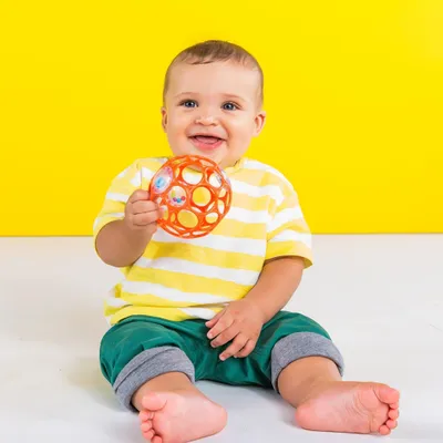 Zdjęcie produktu dla Grzechotka Oball 10 cm pomarańczowa