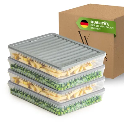 A stack of four food storage containers filled with frozen peas and french fries, with a cardboard box in the background.