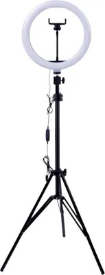 A ring light with a tripod stand and a phone holder.