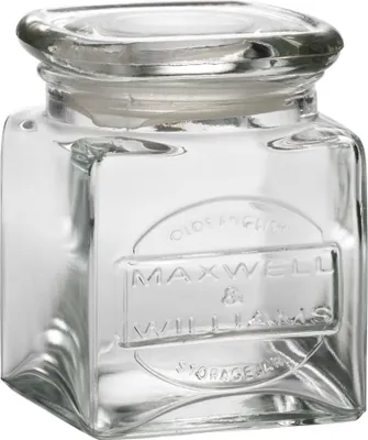 A clear glass storage jar with a lid.