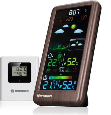 A weather station with a separate sensor unit, displayed on a white background.