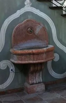 Produktbild von Casa Padrino Luxus Barock Wandbrunnen Antik Braun 85 x 58,5 x H. 146 cm - Prunkvoller Barockstil Keramik Brunnen - Barock Garten Brunnen - Barock Deko Accessoires