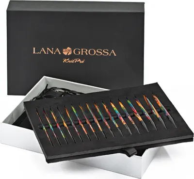 A set of knitting needles in a presentation box, with the brand logo visible on the lid.