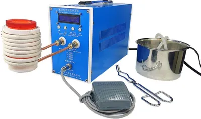 Produktbild von ele eleoption Induktionserwärmungsmaschine 3000W ZVS für Metallschmelzen, Hochfrequenzschweißen & Abschreckung. Maße: 33x14x21 cm, 6 kg. Mit Digitalanzeige, austauschbarer Heizspule, Fußschalter-Anschluss, Wasserkühlung. 110-230V. Geeignet für Gold, Silber, Kupfer, Eisen, Aluminium, Zinn, Zink.