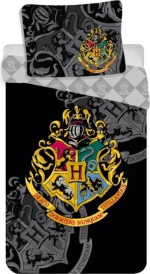 A close-up view of a Harry Potter themed duvet cover and pillowcase set, featuring the Hogwarts crest.