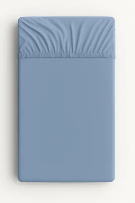 Obrázok produktu pre Bavlnené prestieradlo do detskej postieľky 140x70 cm - špinavomodré