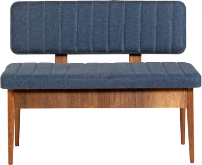 A studio shot of a blue upholstered bench with a wooden frame.