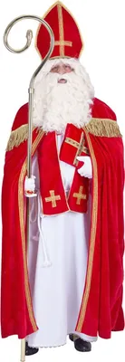 A man dressed as Saint Nicholas holding a staff.
