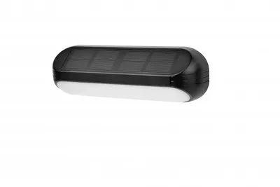 A solar-powered LED facade light with a black top and white bottom, shown against a white background.