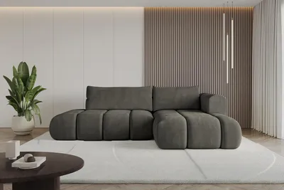 A modern living room with a large sectional sofa.