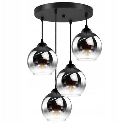 A multi-pendant light fixture with four glass shades.