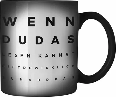 Produktbild von Trendation - Optiker Geschenk Farbwechsel Zauber-Tasse Augenarzt Lustiger Spruch Augenarztpraxis Geschenke Optikerin Meister Meisterin (Schwarz)