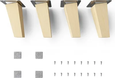 Four wooden furniture legs with metal mounting plates, along with small square felt pads and screws, are laid out on a white background.