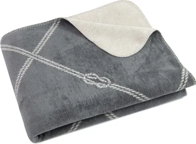 A folded blanket with a nautical rope pattern.