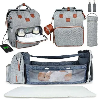 Obrázok produktu pre Plienka na prebaľovanie, cestovná taška s odnímateľným vankúšikom, držiak na fľašu a popruh na kočík (+ USB)