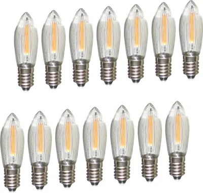A collection of LED filament light bulbs arranged in two rows against a white background.