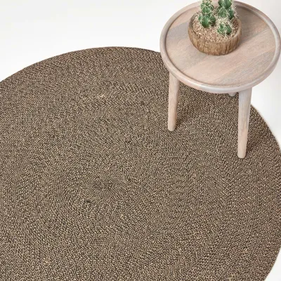 Produktbild von HOMESCAPES Geflochtener handgewebter Teppich in beige und schwarz, 120 cm rund