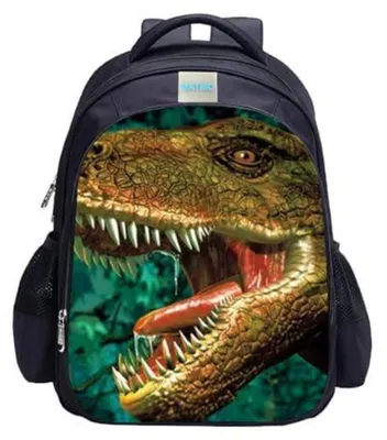 Immagine prodotto di Zaino per bambini a forma di dinosauro, dimensioni 42x32x17 cm, realizzato in nylon idrorepellente, adatto a bambini e bambine