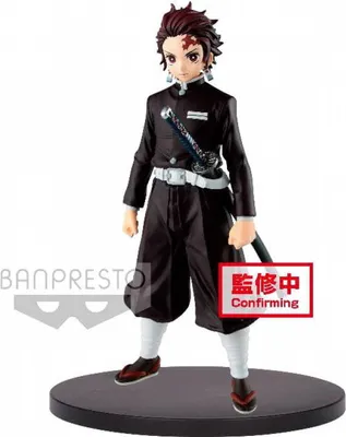 A figurine of Tanjiro Kamado from Demon Slayer standing on a display base.