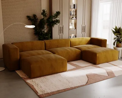 A modern living room with a large sectional sofa, a floor lamp, and built-in shelving.