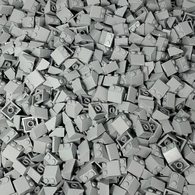 A pile of light gray LEGO bricks.