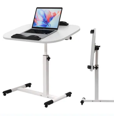 A white adjustable laptop table with a laptop on it, shown from the front and side.
