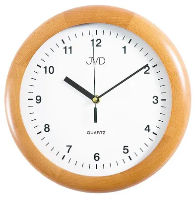 A close-up shot of a wall clock with a wooden frame.