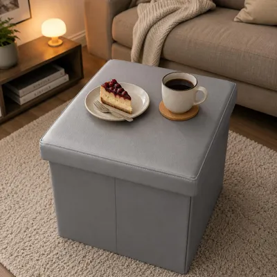 Produktbild von belviona Sitzhocker mit Stauraum, faltbare Aufbewahrungsbox mit gepolsterter Sitzfläche, belastbar bis 300 kg, 38x38x38 cm, grau