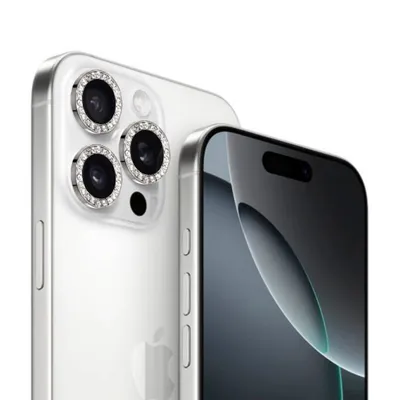 A close-up shot of the back and front of a silver iPhone, with decorative rings around the camera lenses.