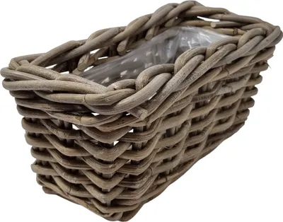 A rectangular rattan planter basket with a plastic liner, shown from a slightly elevated side angle against a white background.