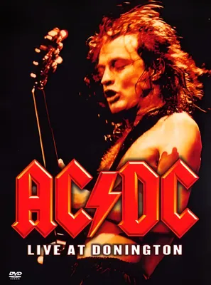 A concert DVD cover featuring a shirtless man playing a guitar.