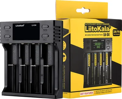 A product shot of a battery charger and its packaging.
