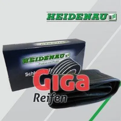 A black box with the Heidenau logo and branding, next to a folded-up tire inner tube, with large red text 'Giga Reifen' overlaying the image.